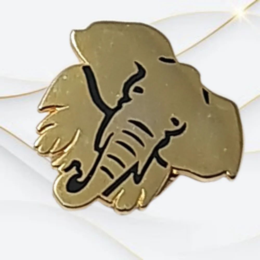 Gold Tone Elephant with Magnetics Snap on the Back
